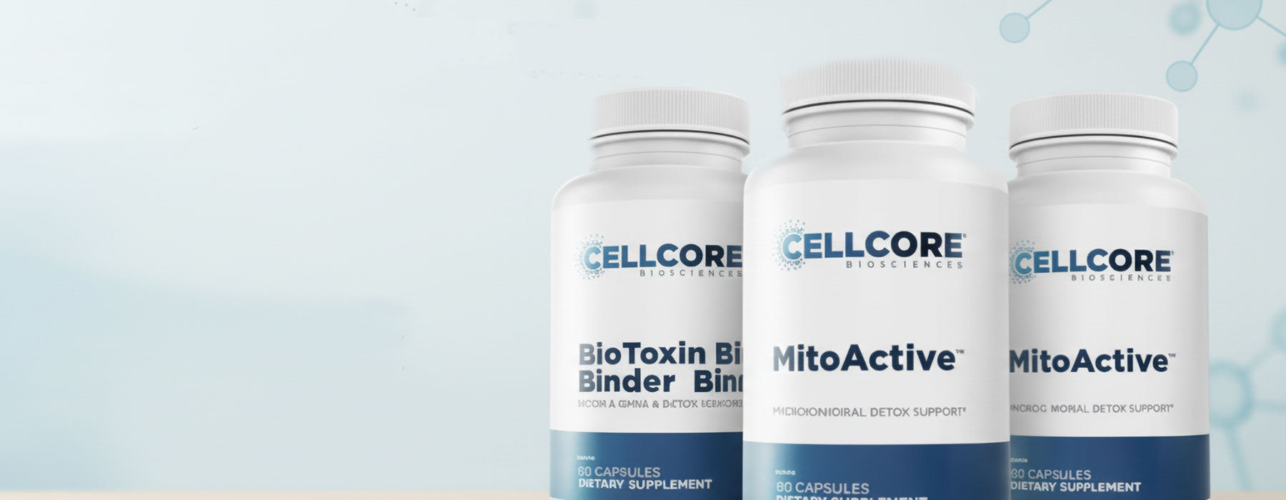 Three bottles of Cellcore supplements on a light blue background