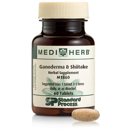 A bottle of Ganoderma & Shiitake herbal supplement next to a tablet.
