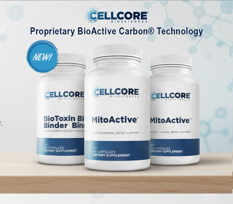 Three CELLCORE supplements on a wooden surface with a light blue background
