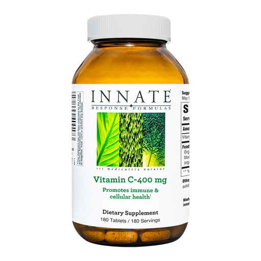 A bottle of Innate Response Formulas Vitamin C-400 mg dietary supplement, containing 180 tablets. The amber glass bottle has a white cap and a white label with green and black text and a leaf graphic.