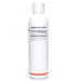 White supplement bottle with label on a white background