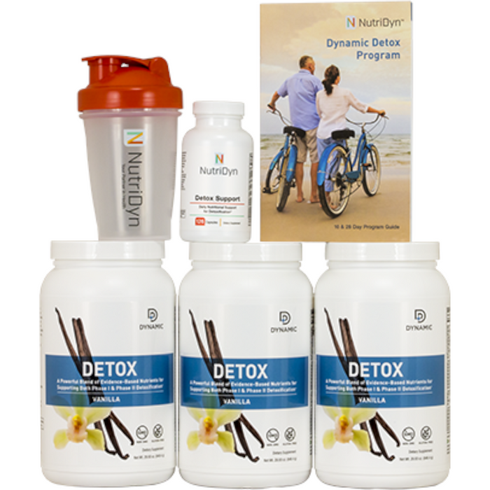 A set of supplements from NutriDyn's Dynamic Detox Program, including bottles of supplements and a shaker cup, with an image of a couple riding bicycles on the packaging.